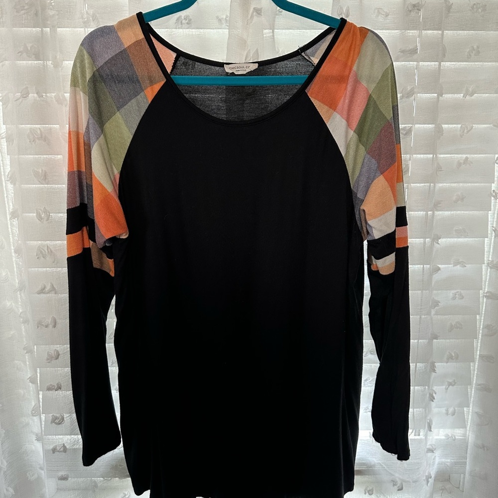 Black "Slouchy Tunic" with plaid shoulder caps. Chic Soul 1X